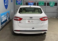2014 Ford Fusion in Conyers, GA 30094 - 18070613 6