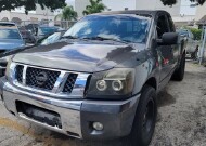 2012 Nissan Titan in Pompano Beach, FL 33064 - 2075258 1